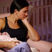 Mother With Baby Suffering From Post Natal Depression